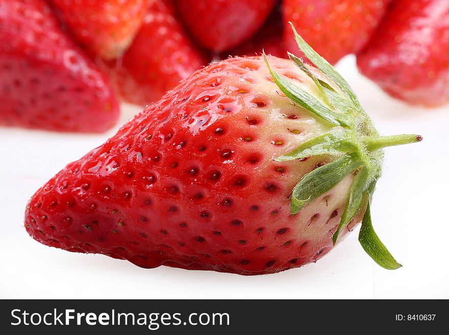 Fresh ripe strawberries on white background. Fresh ripe strawberries on white background.