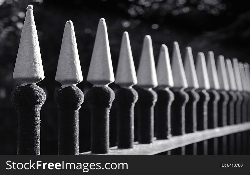 Frosted metal railing spikes with diminishing perspective. Frosted metal railing spikes with diminishing perspective