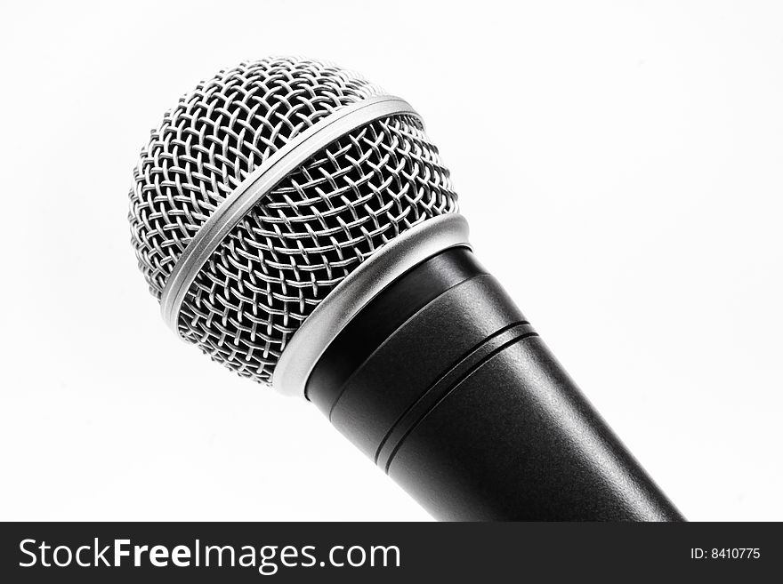 A chromed black microphone isolated on white background