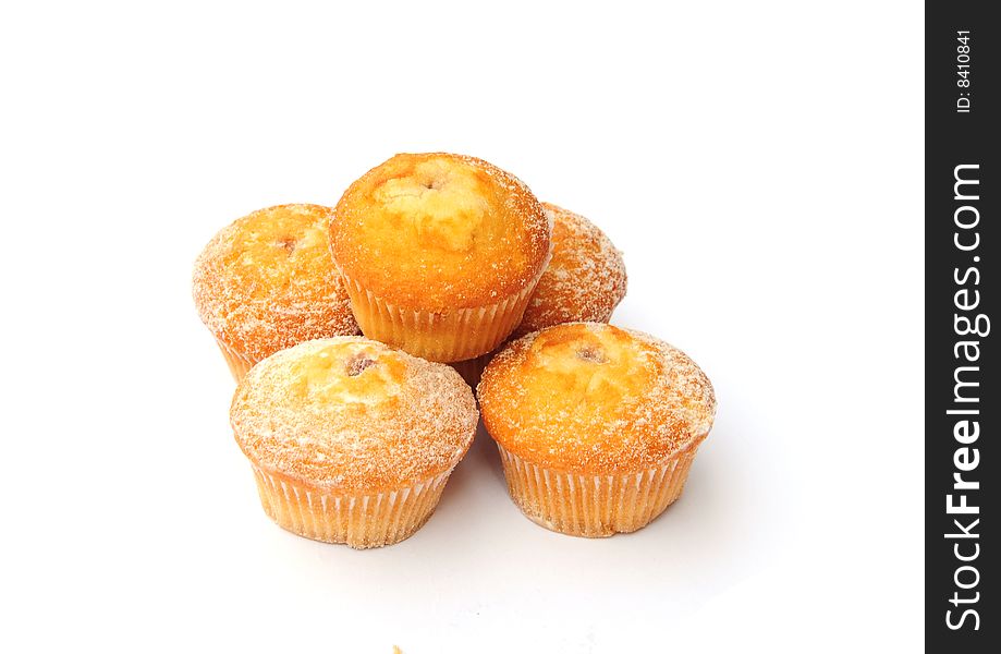 Shot of some home made sponge cakes on white. Shot of some home made sponge cakes on white