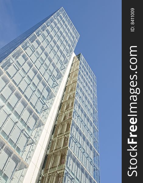 Modern office building on a background of blue sky