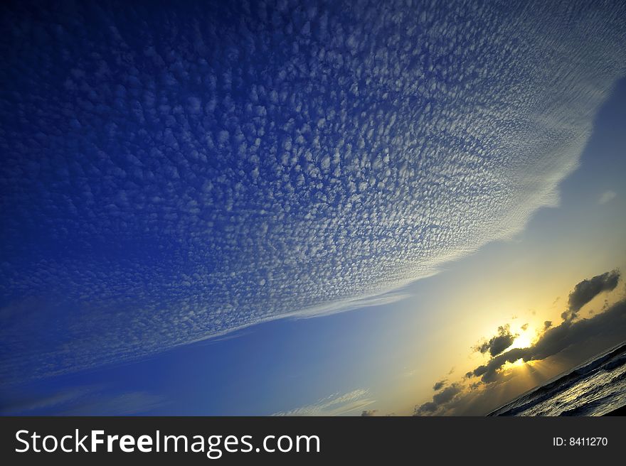 Ultra wide shot of a sunrise with cirrus cloud. Ultra wide shot of a sunrise with cirrus cloud