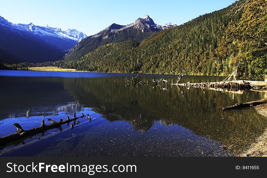 The peaceful lake beside the snow mountain. The peaceful lake beside the snow mountain