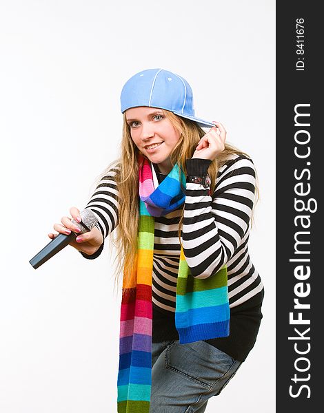 Pretty female with microphone isolated