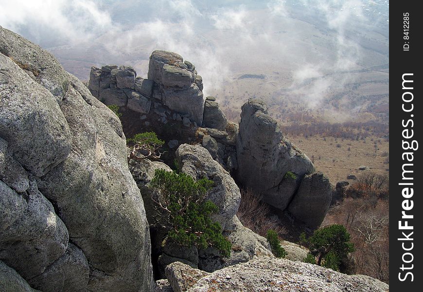 Sunlight Clouds Under Ghosts Vally. Demerdzhi Mountain Rocks, Crimea, Ukraine. Sunlight Clouds Under Ghosts Vally. Demerdzhi Mountain Rocks, Crimea, Ukraine.