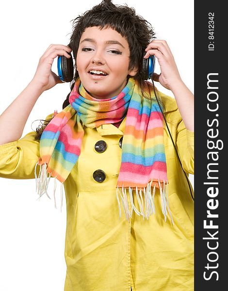 Attractive young woman with headphones over white