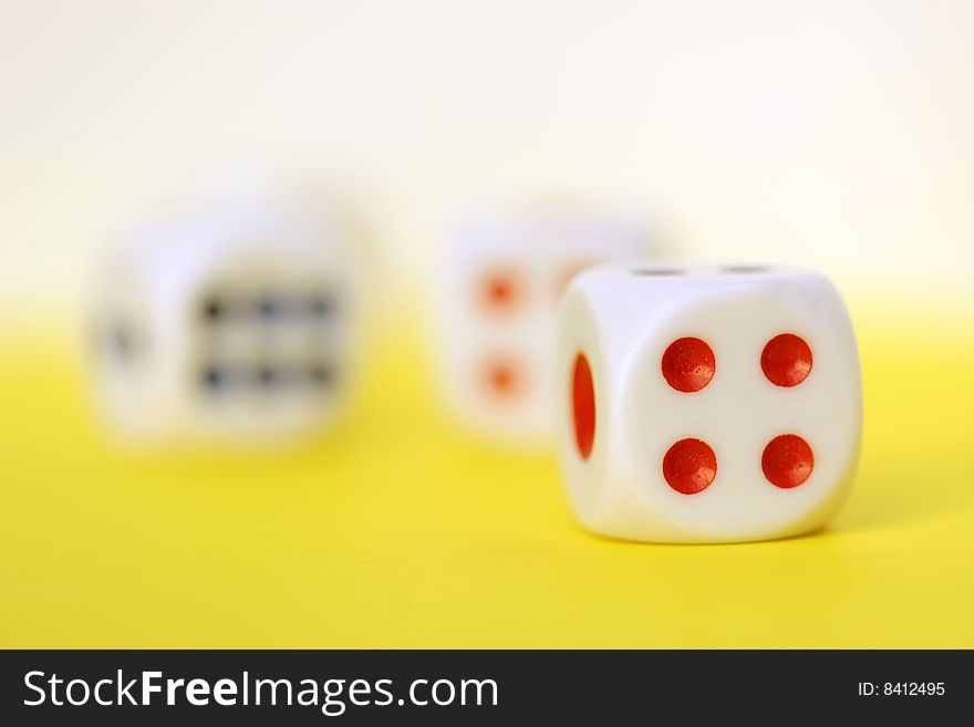 Square dice on color background