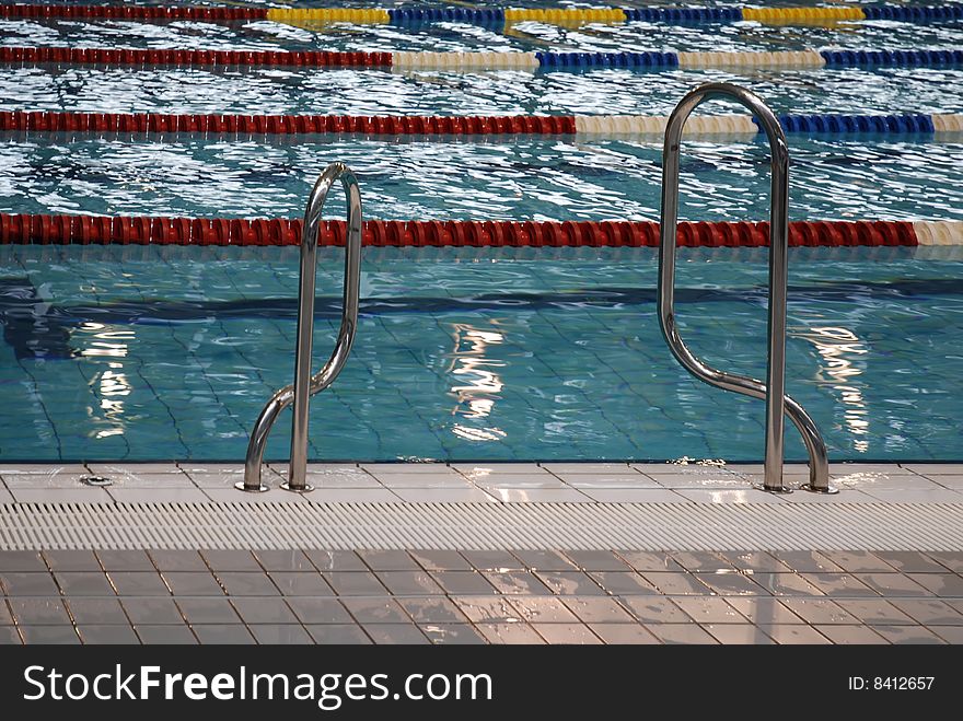 Swimming pool and the blue water. Swimming pool and the blue water