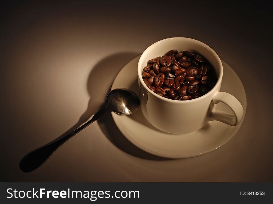 Cup of Fragrant Roasted Coffee Beans