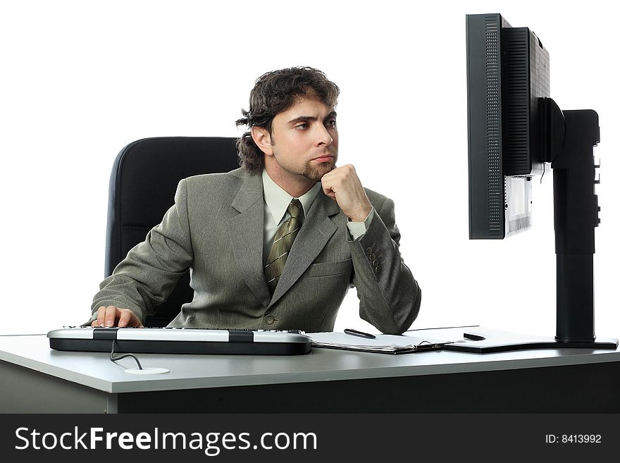 Business theme: handsome businessman in a work process. Business theme: handsome businessman in a work process.