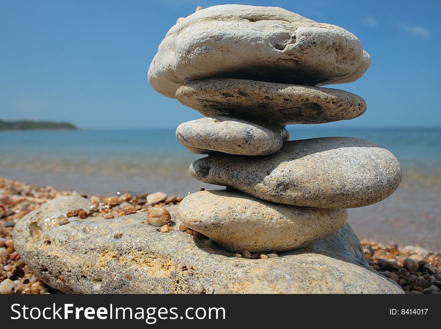 Balanced stones on beach