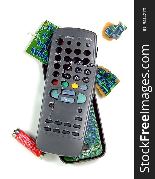 A television remote control that has smashed and broken - isolated over pure white. A television remote control that has smashed and broken - isolated over pure white.