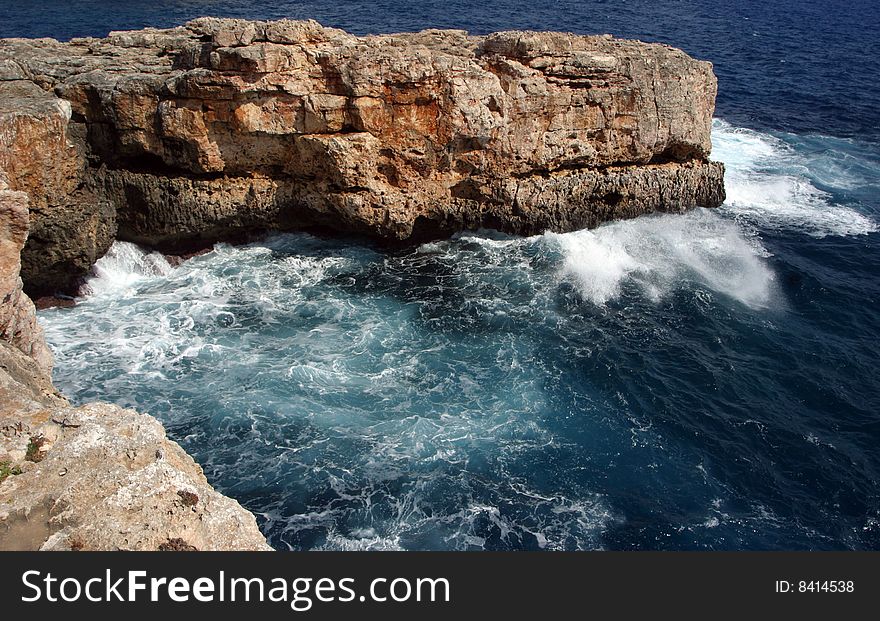 Rocks in the sea in the east of Majorca in Spain