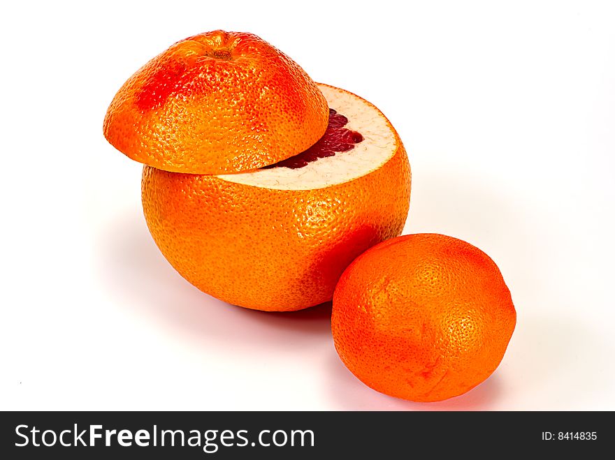 Grapefruit and orange on white