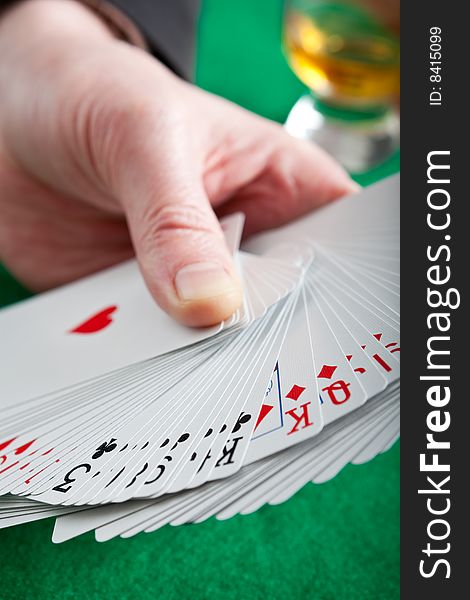 Playing Cards On A Green Cloth