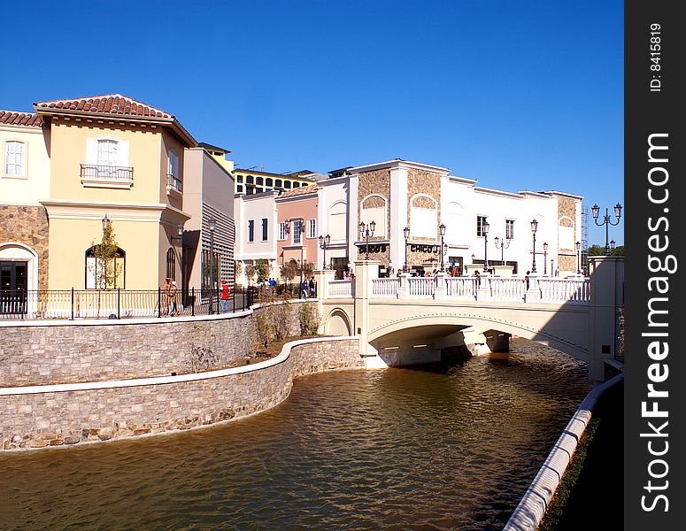 Outdoor shopping mall with a canal running through