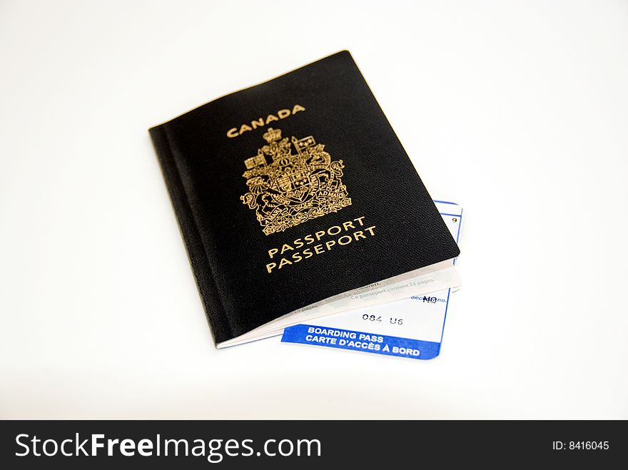 Canadian Passport and airline bilingual boarding pass. Canadian Passport and airline bilingual boarding pass