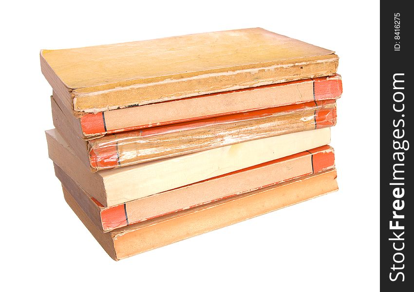 Old paperback books isolated against a white background