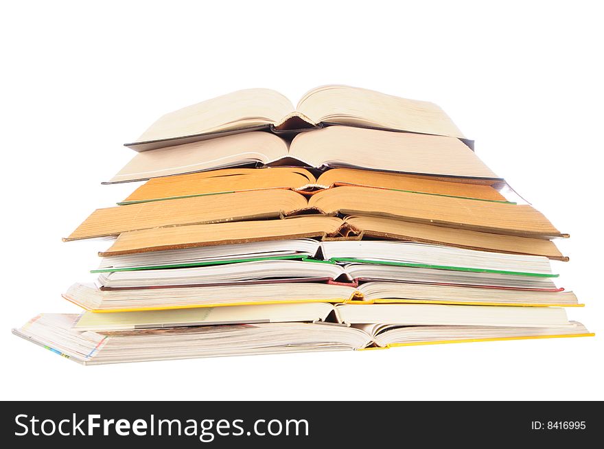 Stack of opened books isolated on white background