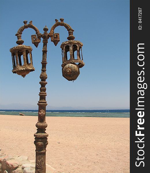 Lamp post on the beach on the Red Sea in Egypt