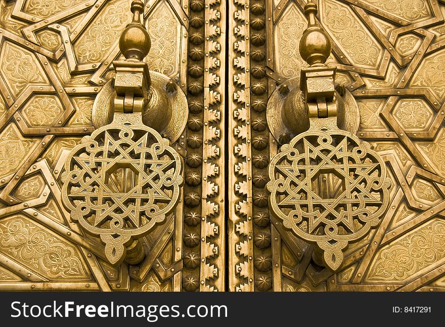 Old bronze door handles of the imperial palace of fez