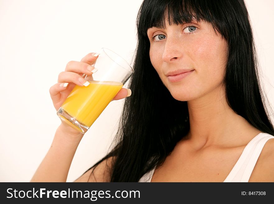 Natural woman drinking juice on white background. Natural woman drinking juice on white background