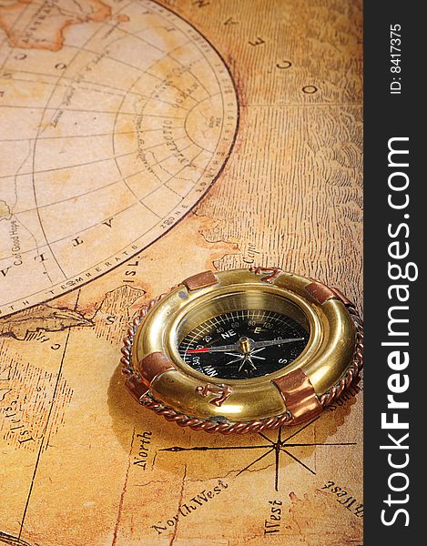 Old-fashioned Compass On A Background