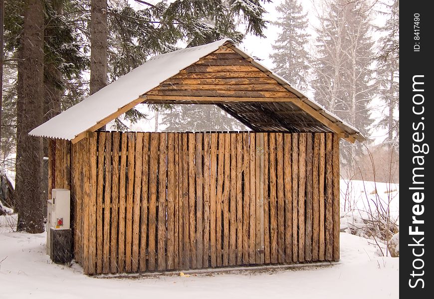 Wooden cabin in winter scenery