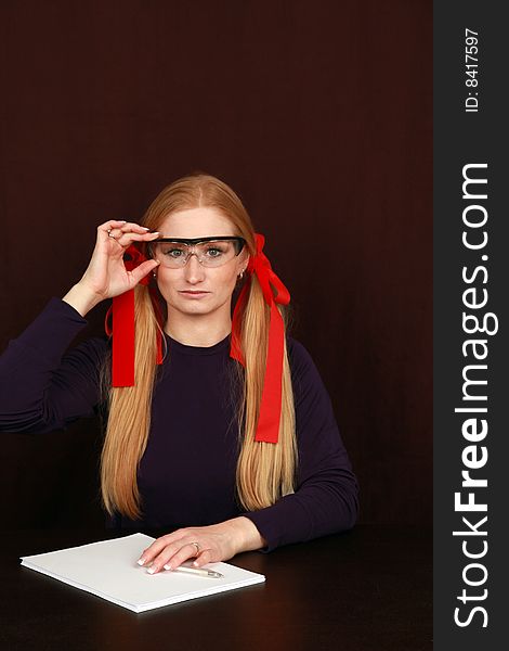 Metaphoric business portrait of woman with glasses with contract. Metaphoric business portrait of woman with glasses with contract