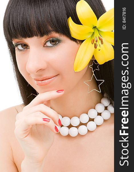 Young woman with lily flower on the white background