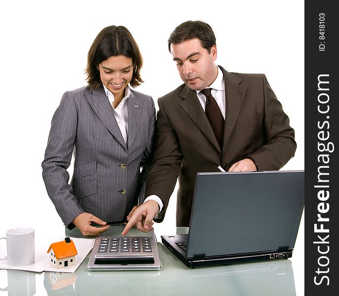 Two friendly business partners working on a laptop computer