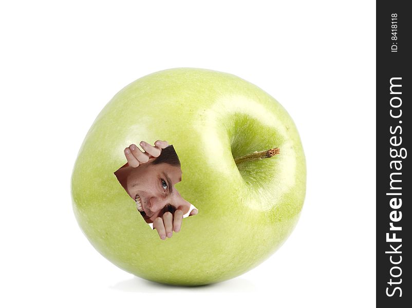 Fresh green apple with man inside at white background. Fresh green apple with man inside at white background