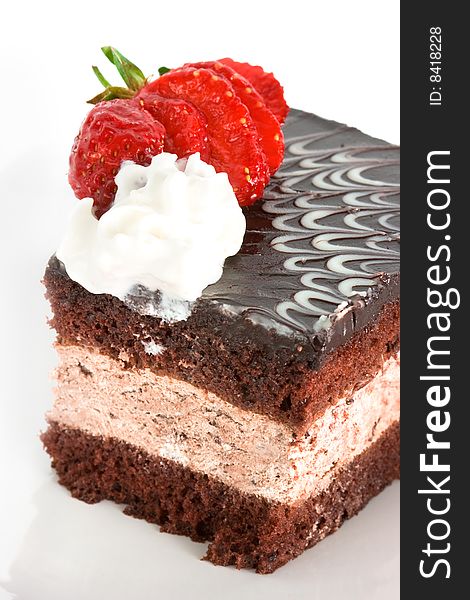 Piece of chocolate cake with strawberry