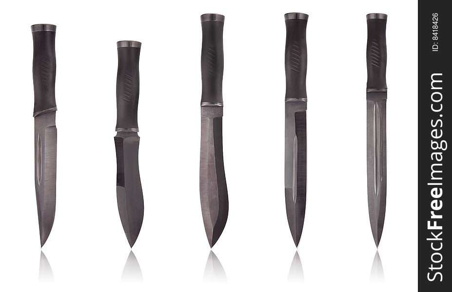 Five black knifes isolated on white