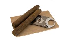 Cigars And A Guillotine Royalty Free Stock Photo