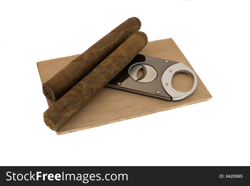Cigars and a guillotine isolated on white