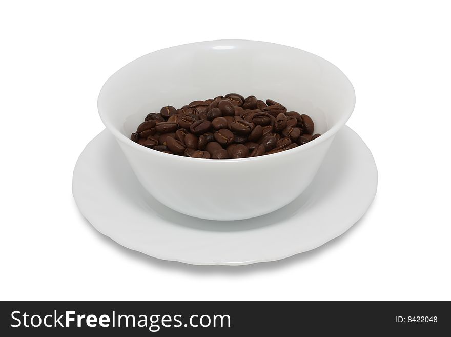 Coffee beans in a saucer