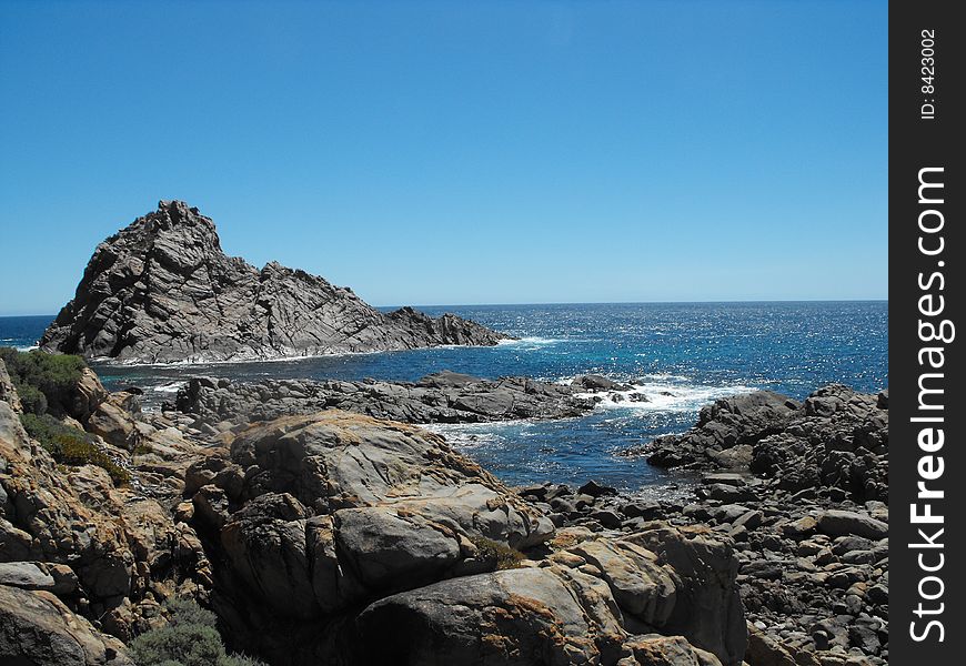 Photo of sugarloaf rock on cape natraliste.