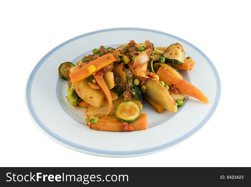 A plate of cooked vegetables. A plate of cooked vegetables