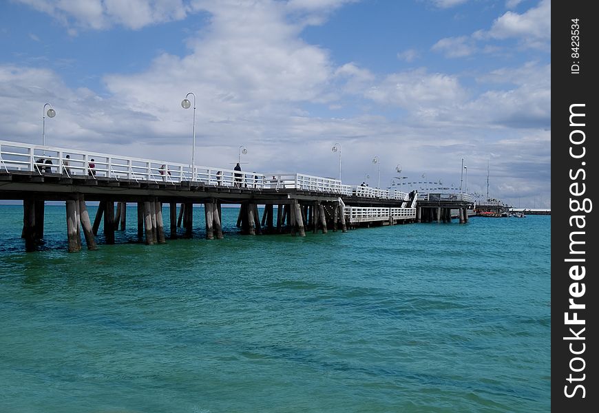 A long pier on a bright day