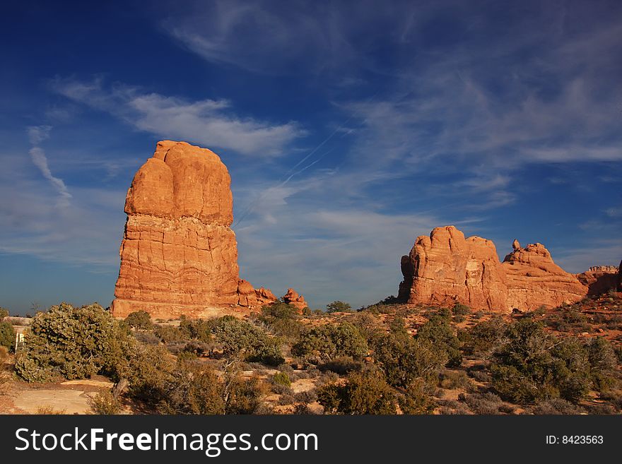 View of the red rock formations in Arches National Park with blue sky�s and clouds