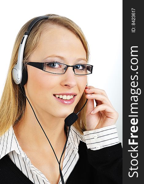 Friendly Customer Representative with headset smiling during a telephone conversation