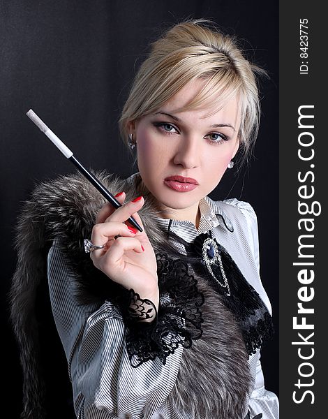 Girl with fur and cigarette. Girl with fur and cigarette