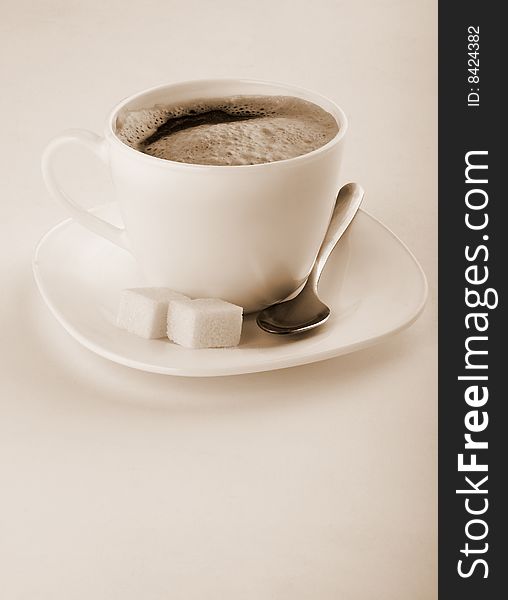 Coffee cup on a brown background