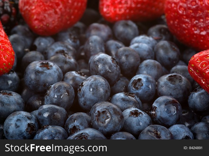 Organic healthy blueberries and strawberries. Organic healthy blueberries and strawberries