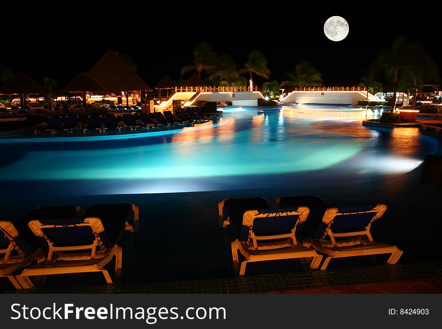 A luxury all inclusive beach resort at night in Cancun Mexico