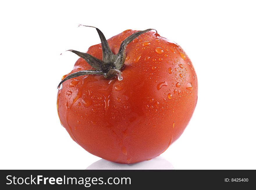 Tomato with water drops isolated on white.. Very high detail texture.