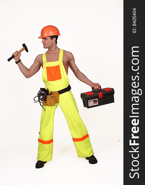 Young handsome electrician . Over white background