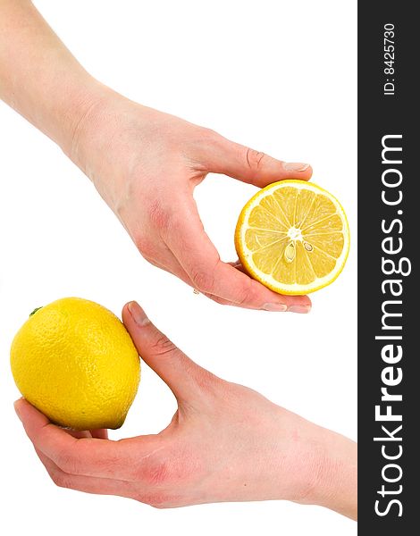 Woman s hands holding citrus fruits (lemon)