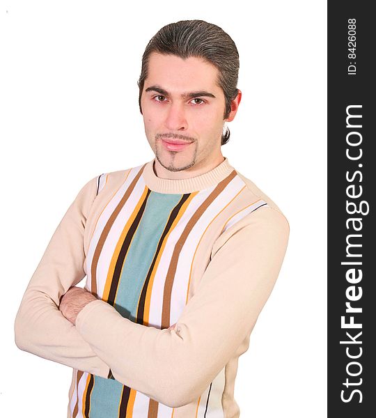 Young dark haired caucasian man in striped sweater isolated on white. Young dark haired caucasian man in striped sweater isolated on white
